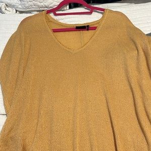 URBAN OUTFITTERS. short sleeve off the shoulder loose shirt